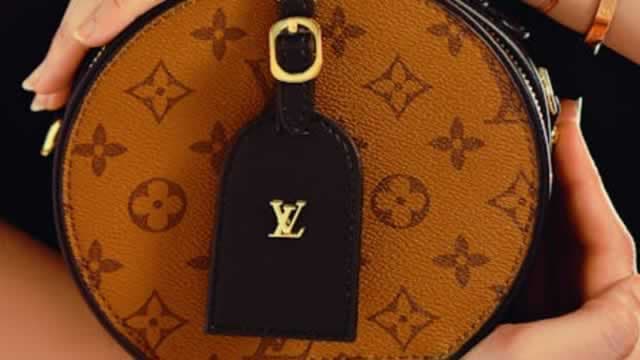 In sweltering Paris, Louis Vuitton's waterfall show draws scrutiny